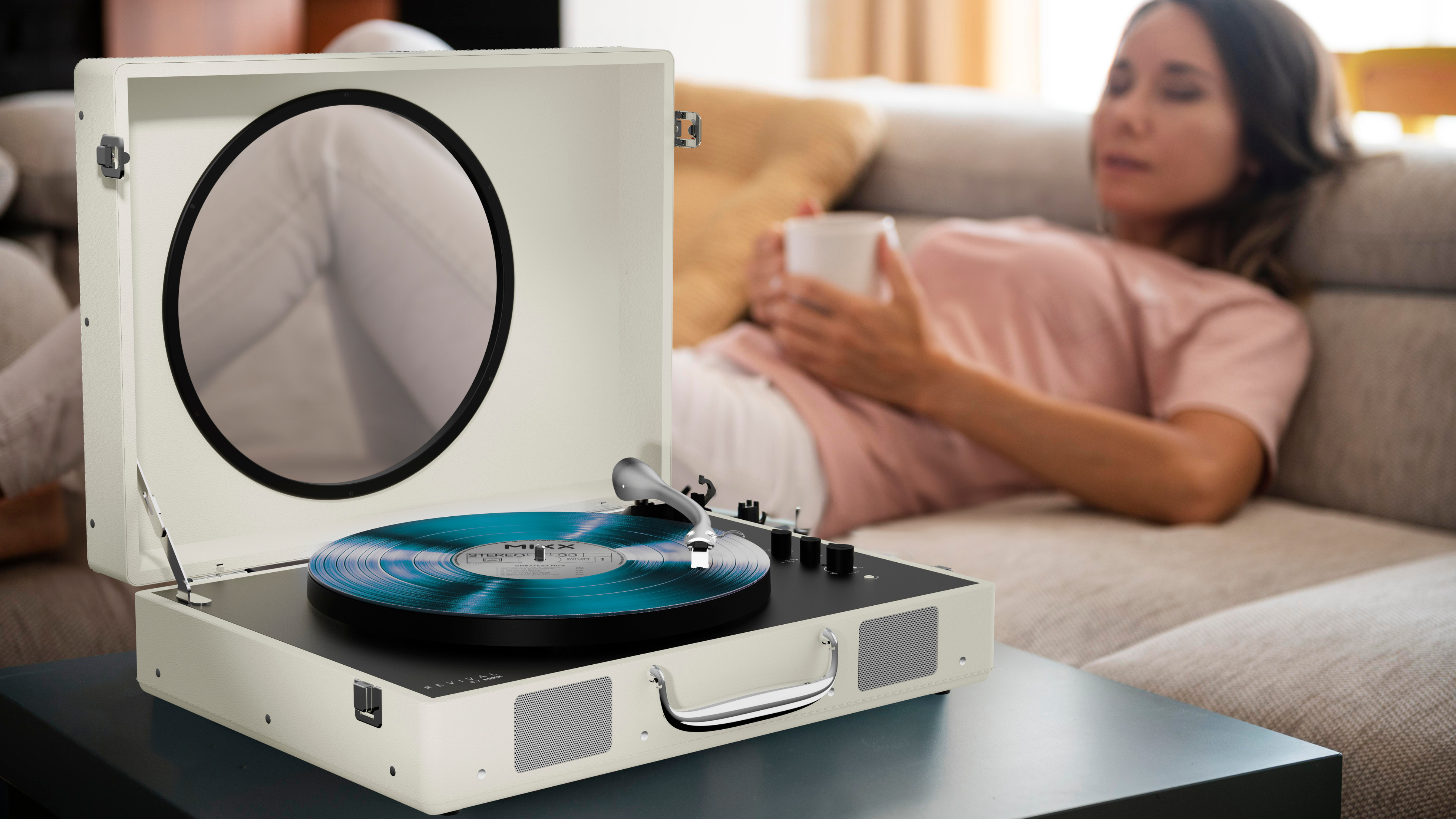 Listening to music on Mixx Revival 65 Record Deck